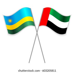 Rwandan and Emirian crossed flags. Rwanda combined with United Arab Emirates isolated on white. Language learning, international business or travel concept.