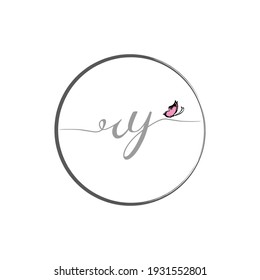 RY initial letter handwriting logo design with butterfly