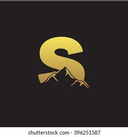 S alphabet mountain negative space letter logo gold black background