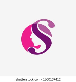 s initial with a face in purple color