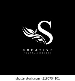 S letter logo vector design with leaf decoration. monogram S, typography. feather logo. luxury S. S flourish. suitable for logo of business, company, product, boutique, wedding, hotel, etc