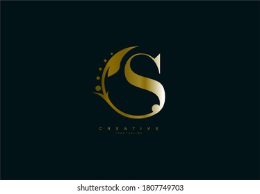 S letter rounded flourishes ornament monogram golden logo