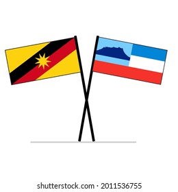 Sabah and Sarawak Malaysian State flags in Borneo Island on poles demonstrating relationship