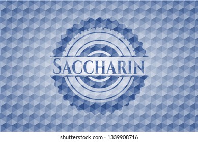 Saccharin blue badge with geometric pattern.