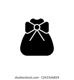 Sack with a bow icon. Simple glyph vector of Christmas, New Year and holidays set for UI and UX, website or mobile application