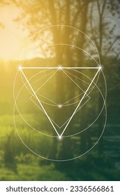 Sacred geometry spiritual new age futuristic illustration with transmutation interlocking circles, triangles and glowing particles