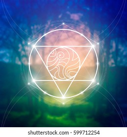 Sacred geometry symbol on blurred photo background. Mathematics and spirituality in nature. Interlocking glowing circles and triangles with golden ration digits.
