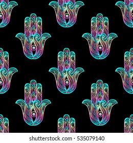 Sacred hand drawn hamsa symbol seamless pattern. Popular Arabic and Jewish amulet. Vector illustration in rainbow colors over black. Repetition background for textiles , wrapping paper or wallpapers.