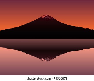 the sacred mountain of Fuji in the background of a red sunset