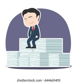 sad asian businessman sitting on his incomplete task stack
