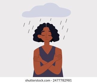 Sad black female character hugging herself with rain cloud over her head.Depressed woman with mental health issues.Vector illustration