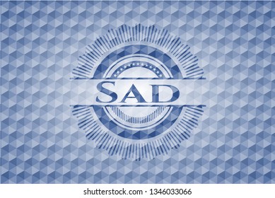 Sad blue badge with geometric background.