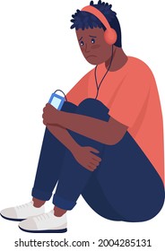 Sad boy listen to music semi flat color vector character. Sitting figure. Full body person on white. Teen problems isolated modern cartoon style illustration for graphic design and animation