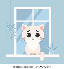 A sad cat sits on the windowsill among flower pots, it’s raining outside the window. Sadness and depression concept.