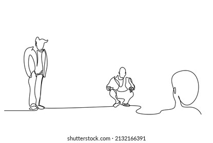 Sad crying man on the floor holding a gun. people consoling their armed friends