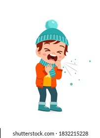 sad cute little kid cough and wear jacket in winter season. child feeling sick wearing warm clothes