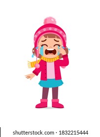 sad cute little kid cry and wear jacket in winter season. child scream crying wearing warm clothes