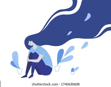 Sad depressed girl suffers from emotional problems, sits and hugs her knees alone
