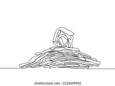 a sad employee lost among documents and books