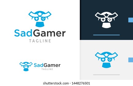 Sad expression logo design, gamepad icon, sad face icon, flat face design, sad gamer design concept