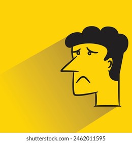 sad face character with shadow on yellow background