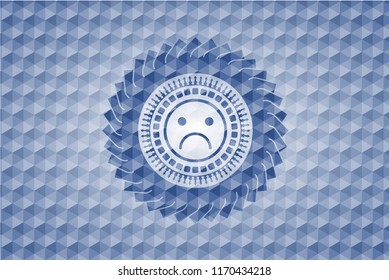 sad face icon inside blue emblem or badge with abstract geometric pattern background.