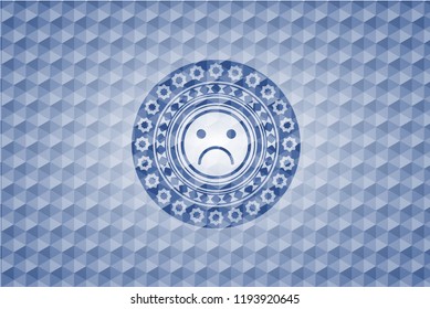 sad face icon inside blue polygonal emblem.