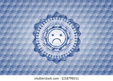 sad face icon inside blue badge with geometric pattern.