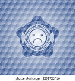 sad face icon inside blue emblem with geometric background.
