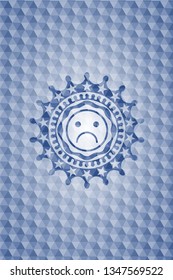 sad face icon inside blue badge with geometric pattern.