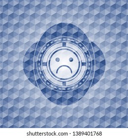 sad face icon inside blue emblem or badge with abstract geometric polygonal pattern background.