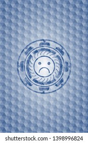 sad face icon inside blue hexagon badge.