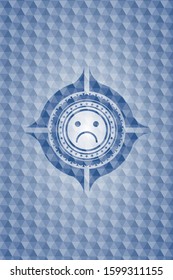 sad face icon inside blue emblem with geometric background.