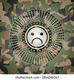 sad face icon inside camouflage emblem. 