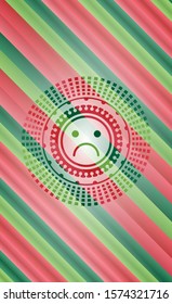 sad face icon inside christmas colors style emblem.