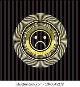 sad face icon inside gold emblem or badge