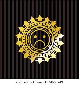 sad face icon inside gold shiny emblem