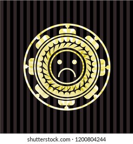 sad face icon inside golden emblem or badge