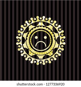 sad face icon inside golden emblem