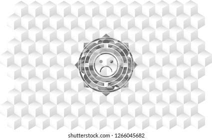 sad face icon inside grey badge with geometric cube white background