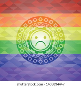 sad face icon inside lgbt colors emblem 