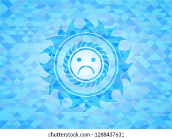 sad face icon inside light blue emblem with triangle mosaic background