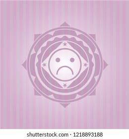 sad face icon inside pink icon or emblem