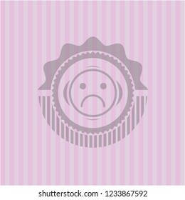 sad face icon inside pink emblem. Vintage.