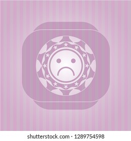 sad face icon inside pink emblem. Vintage.