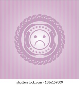 sad face icon inside pink icon or emblem