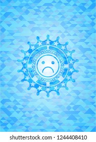 sad face icon inside realistic sky blue emblem. Mosaic background