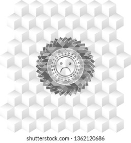 sad face icon inside realistic grey emblem with geometric cube white background