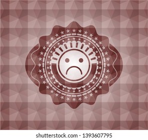 sad face icon inside red geometric emblem. Seamless.