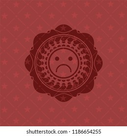 sad face icon inside retro red emblem